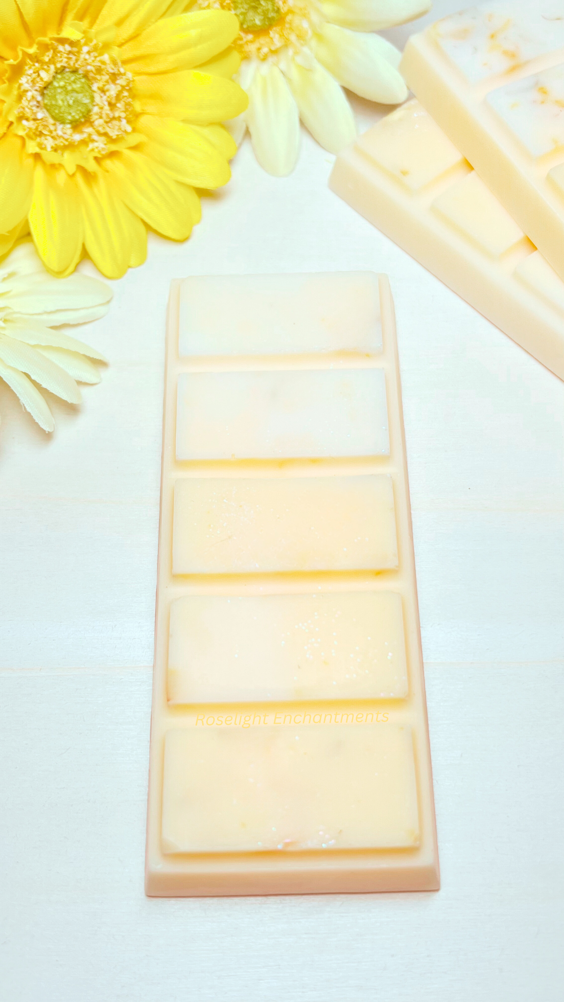 Yellow and white wax snap bar with sparkly biodegradable glitter.